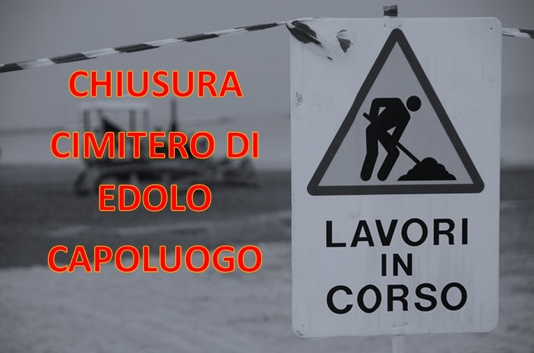 Immagine raffigurante un cartello di lavori in corso con accanto la scritta in rosso